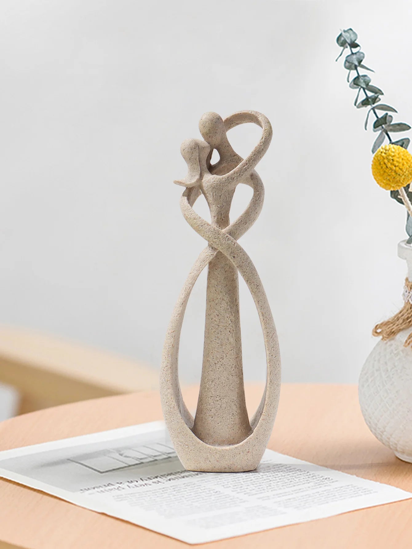 Escultura de Casal Abraçado