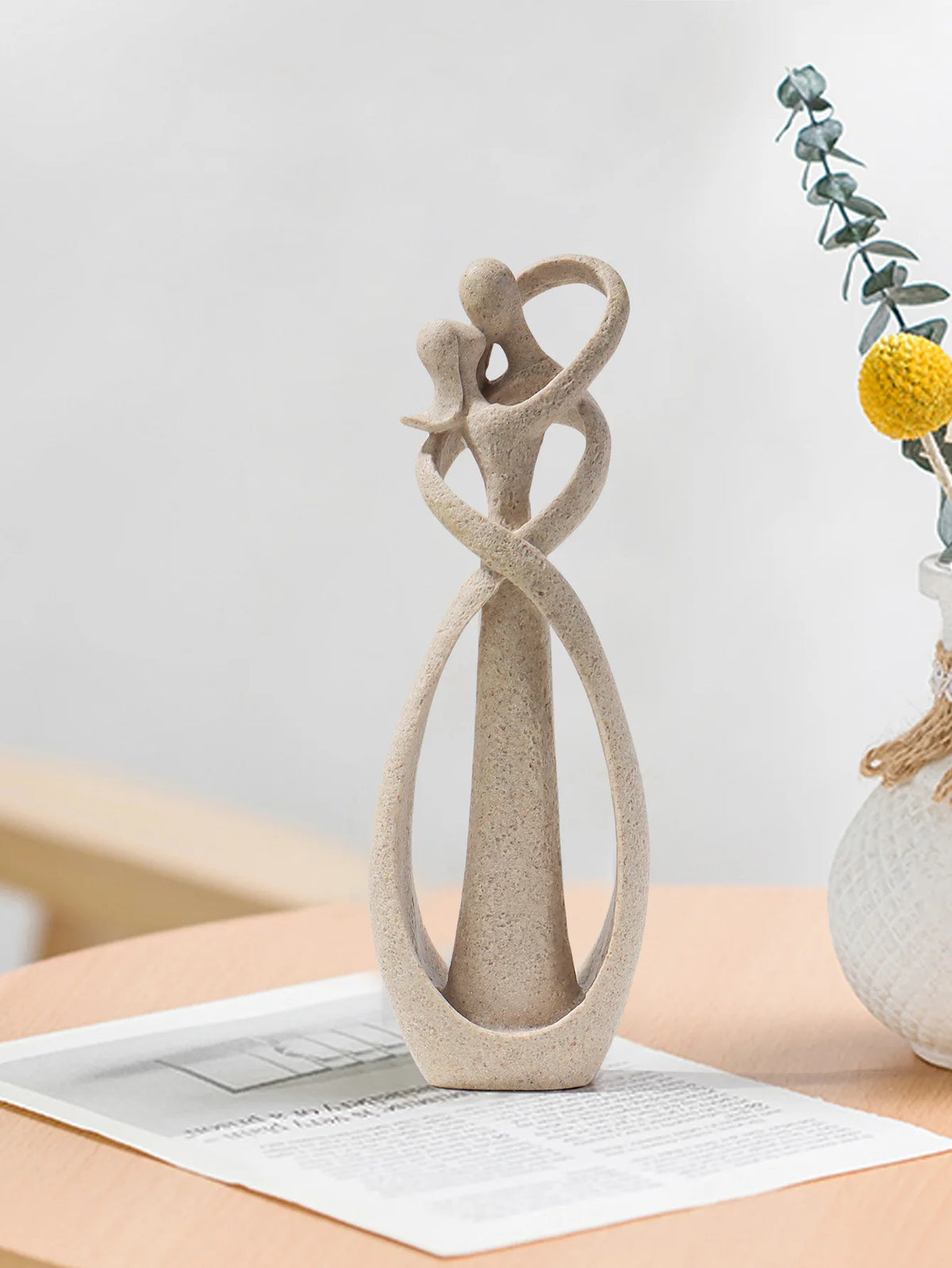 Escultura de Casal Abraçado