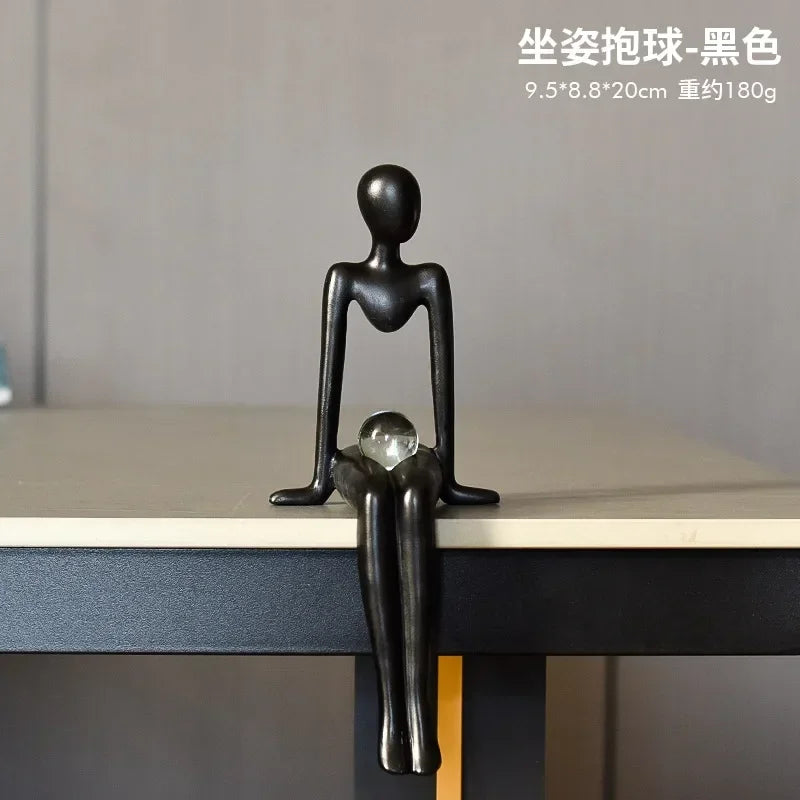 Estatueta Abstrata Sentada