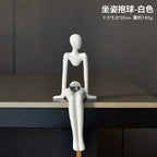 Estatueta Abstrata Sentada