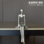 Estatueta Abstrata Sentada