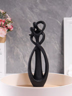 Escultura de Casal Abraçado