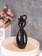 Escultura de Casal Abraçado