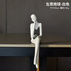 Estatueta Abstrata Sentada